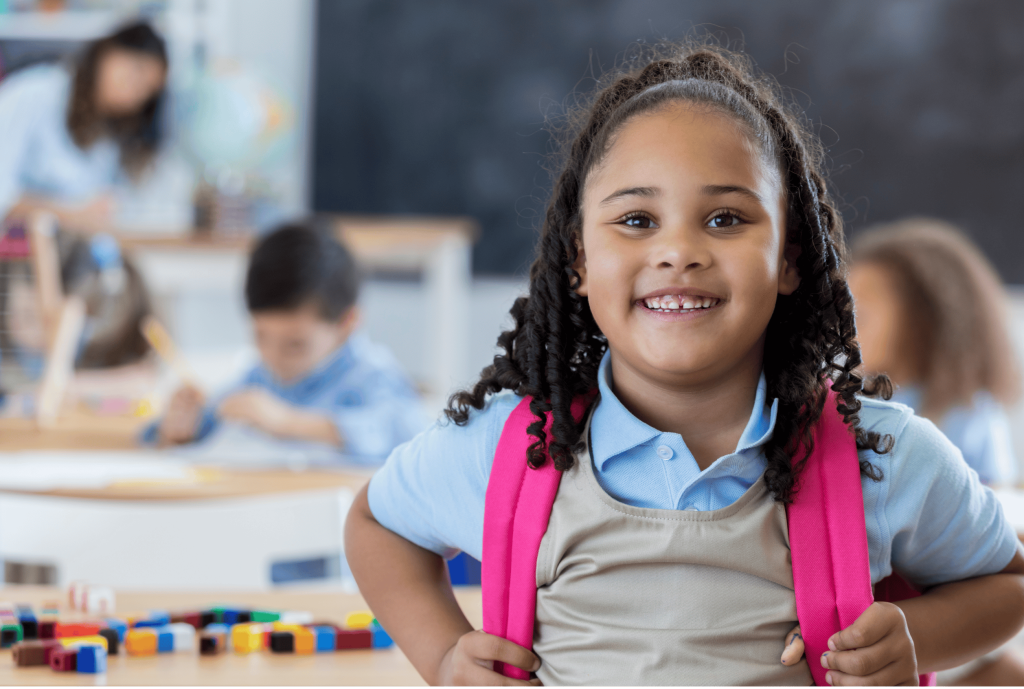 Happy girl at school - social situation Liverpool NDIS