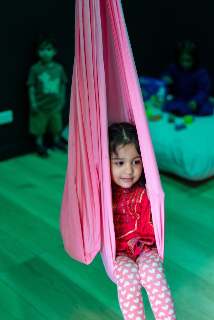 Girl using sensory room at SpiritCare